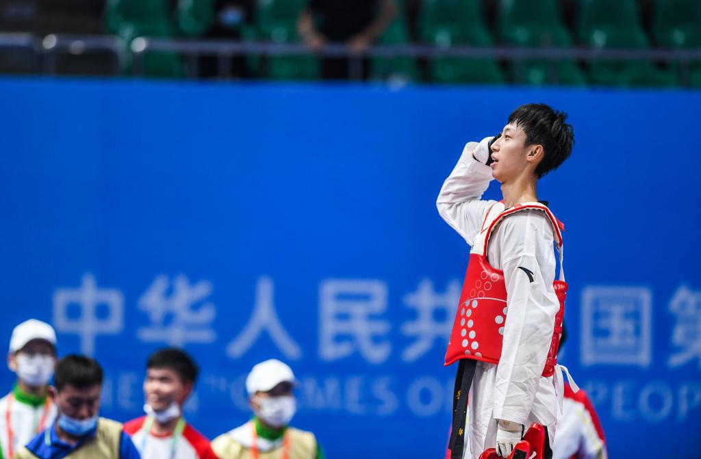 中国运动员勇夺跆拳道比赛金牌，实现突破